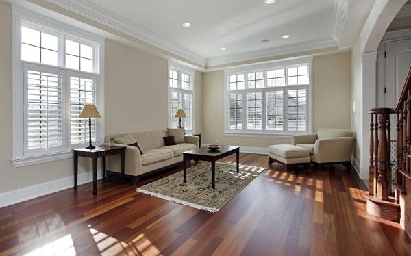 laminate floors are a cost-effective, durable, and easy-to-maintain option that can mimic the look of hardwood or tile